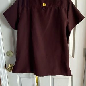Four Stretch Wonderwink 2 piece Scrubs. Maroon Color. Slightly Used.
